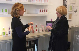 Stephanie de Saint-Aignan with customer