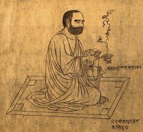 Monk burning incense