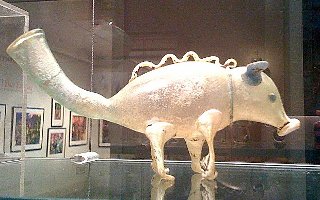 perfume flask in shape of pig