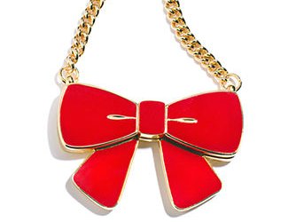 Estee Lauder bow pendant